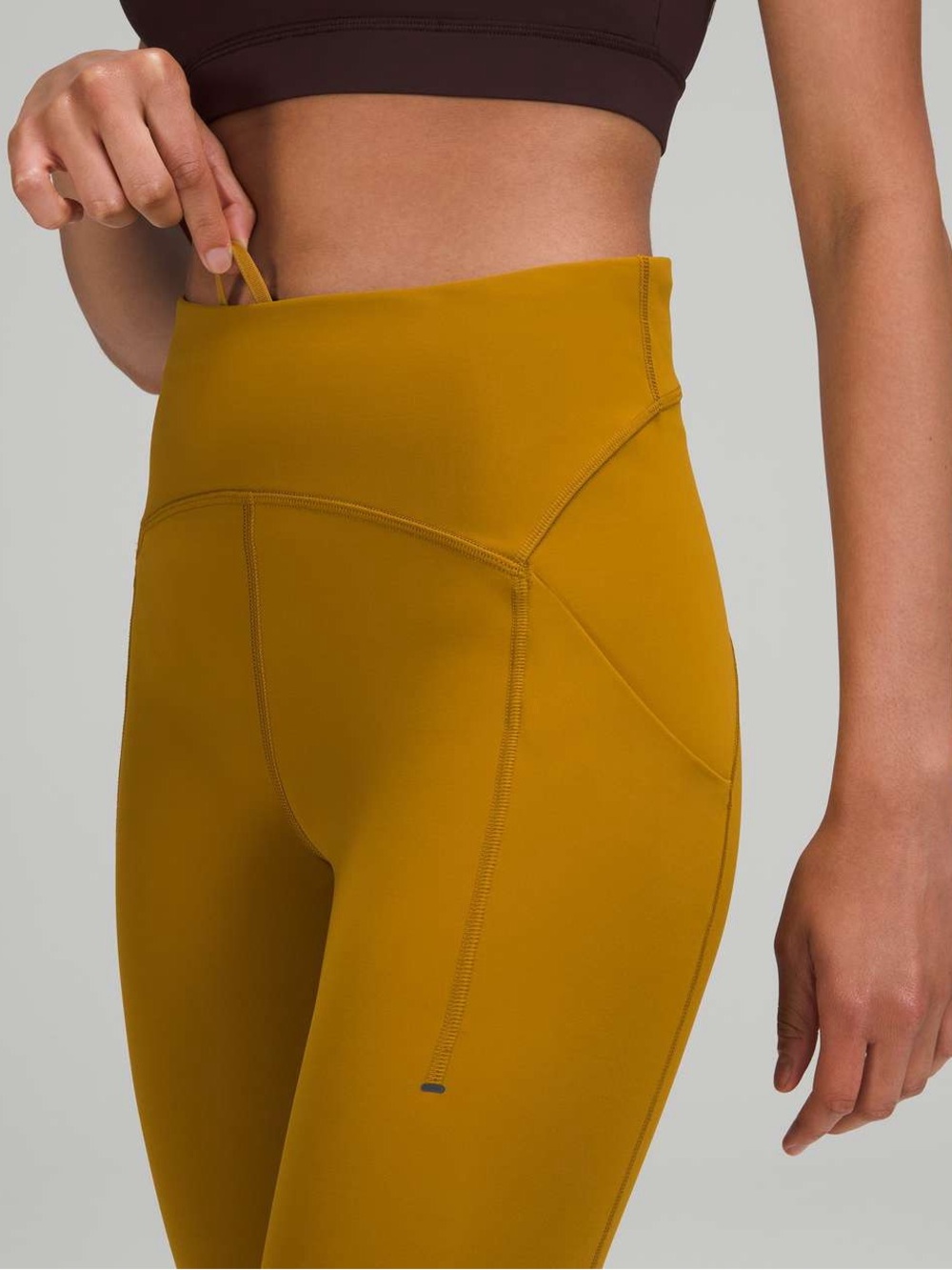 Lululemon Power Thru High-Rise Tight 25” Gold Spice Mustard Yellow Side Pocket 4